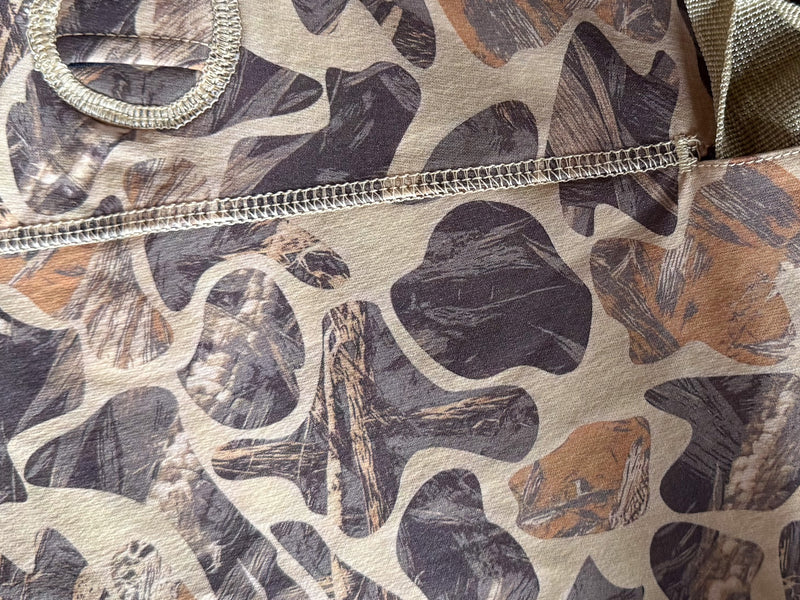 closeup of dog hunting suit